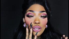 جلام يلتقي القوطي: استكشاف أنماط ماكياج داكنة براقة مع حافة